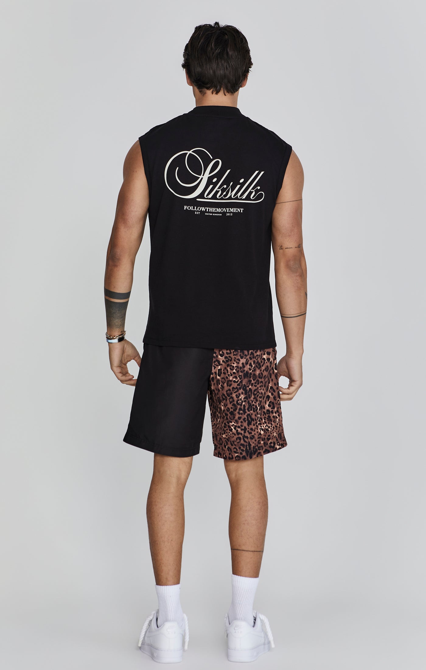 Maglietta senza maniche in nero Top SikSilk   