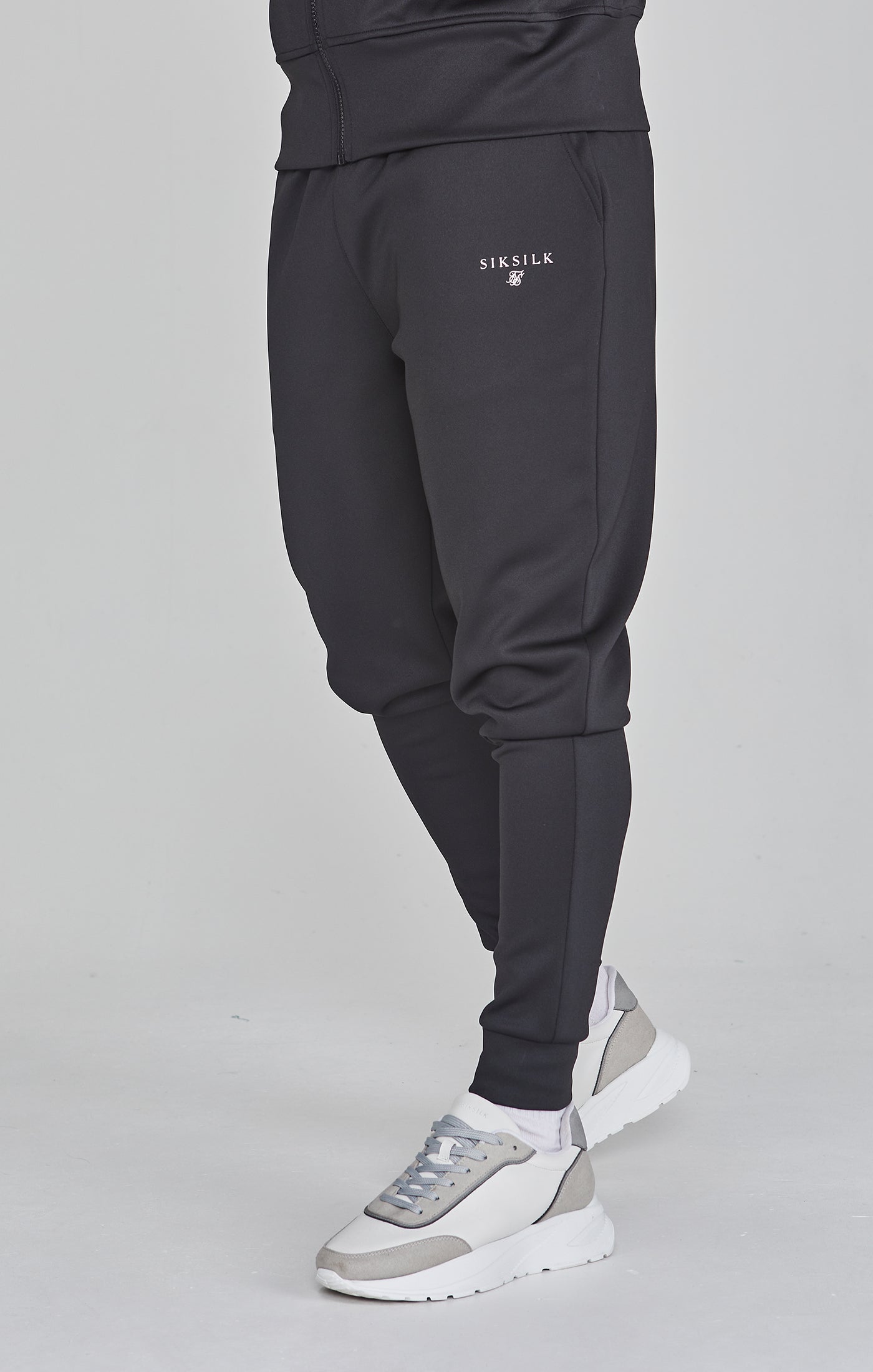 Pantaloni da corsa Essentials in polietilene nero Pantaloni SikSilk   