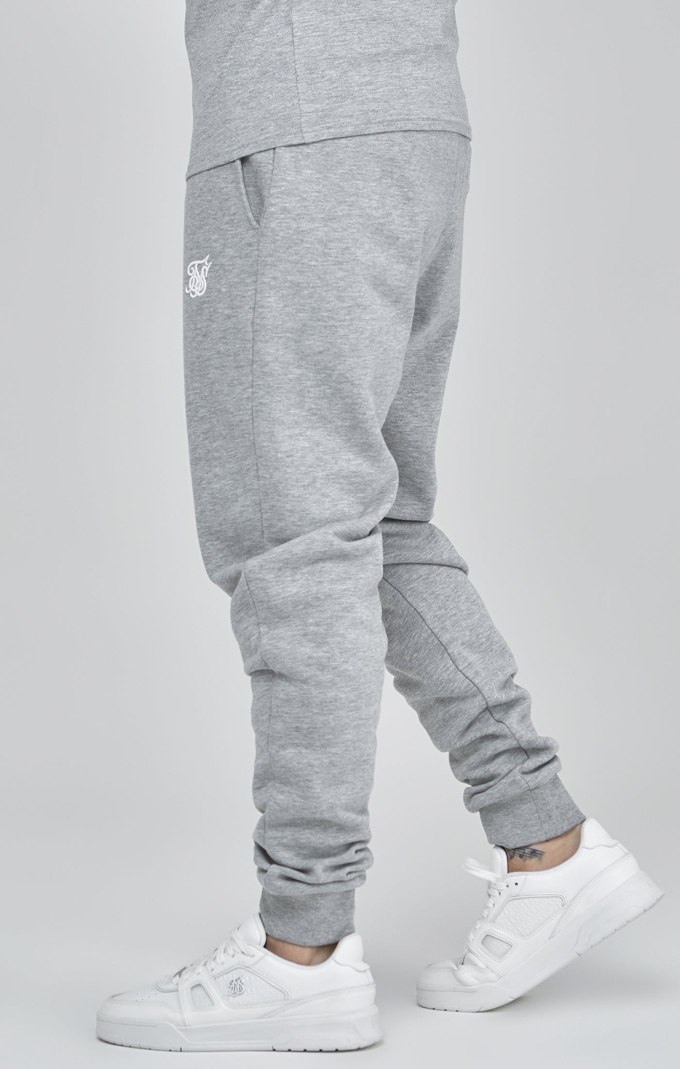 Joggers essenziali in marna grigia Pantaloni SikSilk   