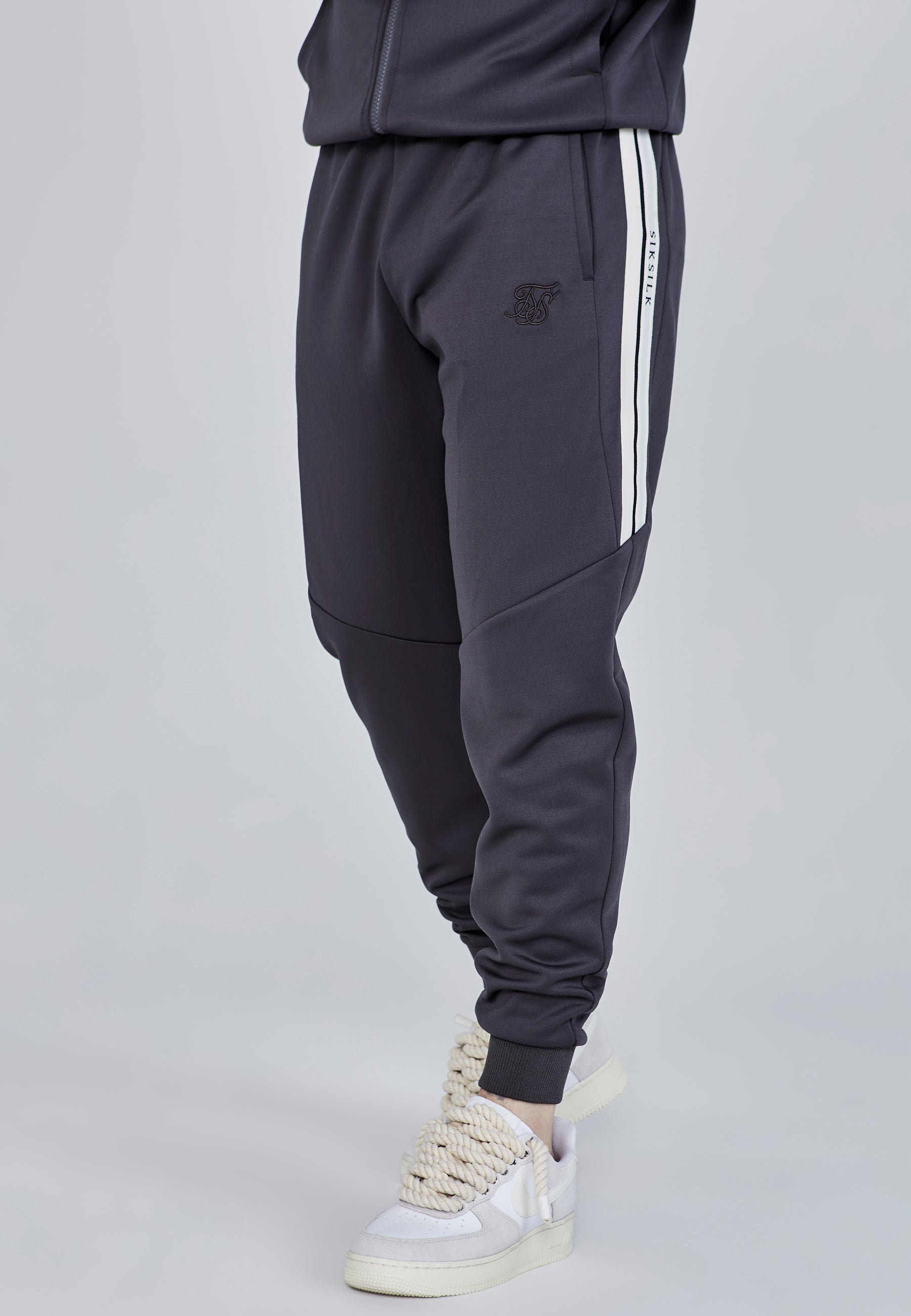 Joggers dal taglio rilassato in pantaloni grigi SikSilk   