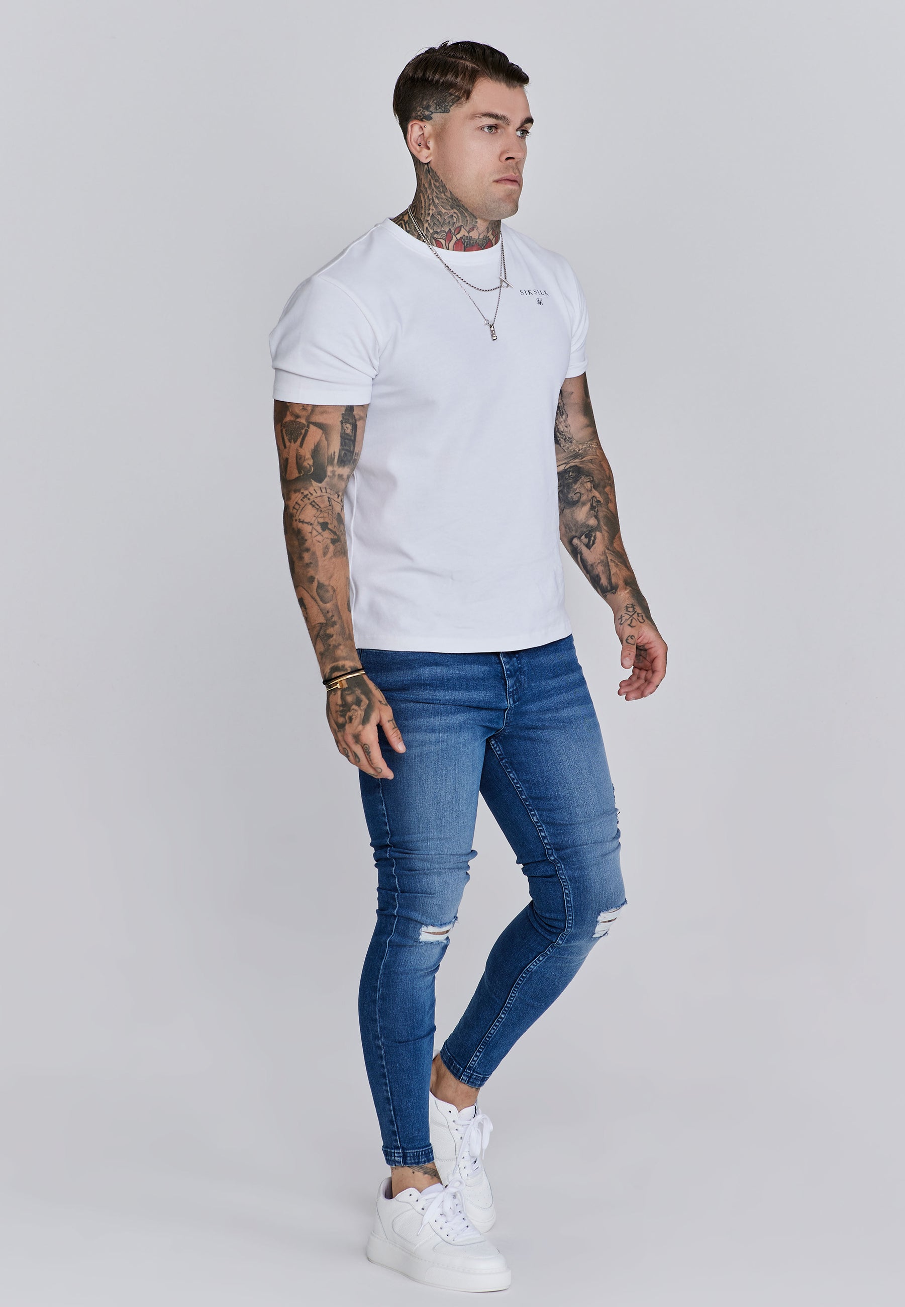 Jeans skinny invecchiati in jeans blu SikSilk