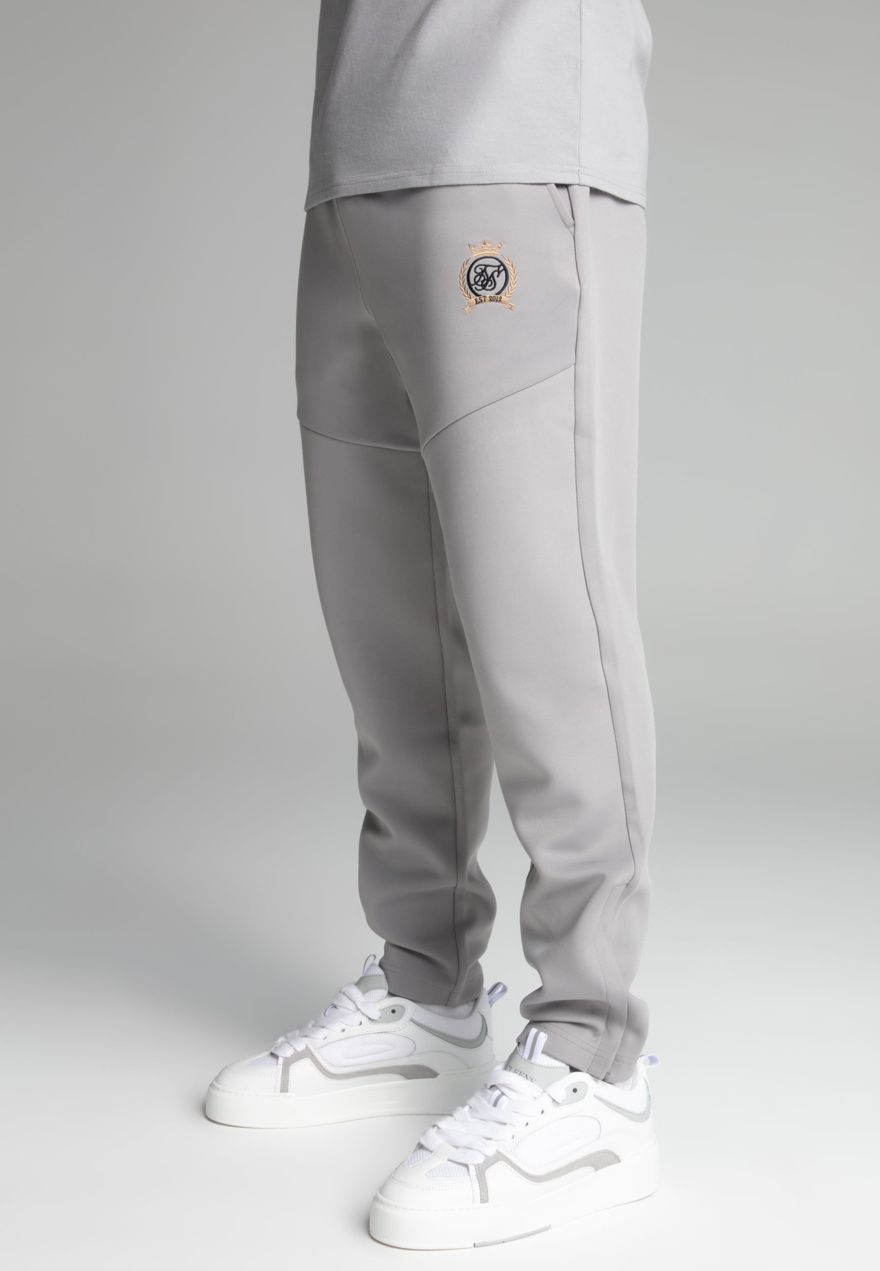 Pantaloni da corsa in grigio Pantaloni SikSilk