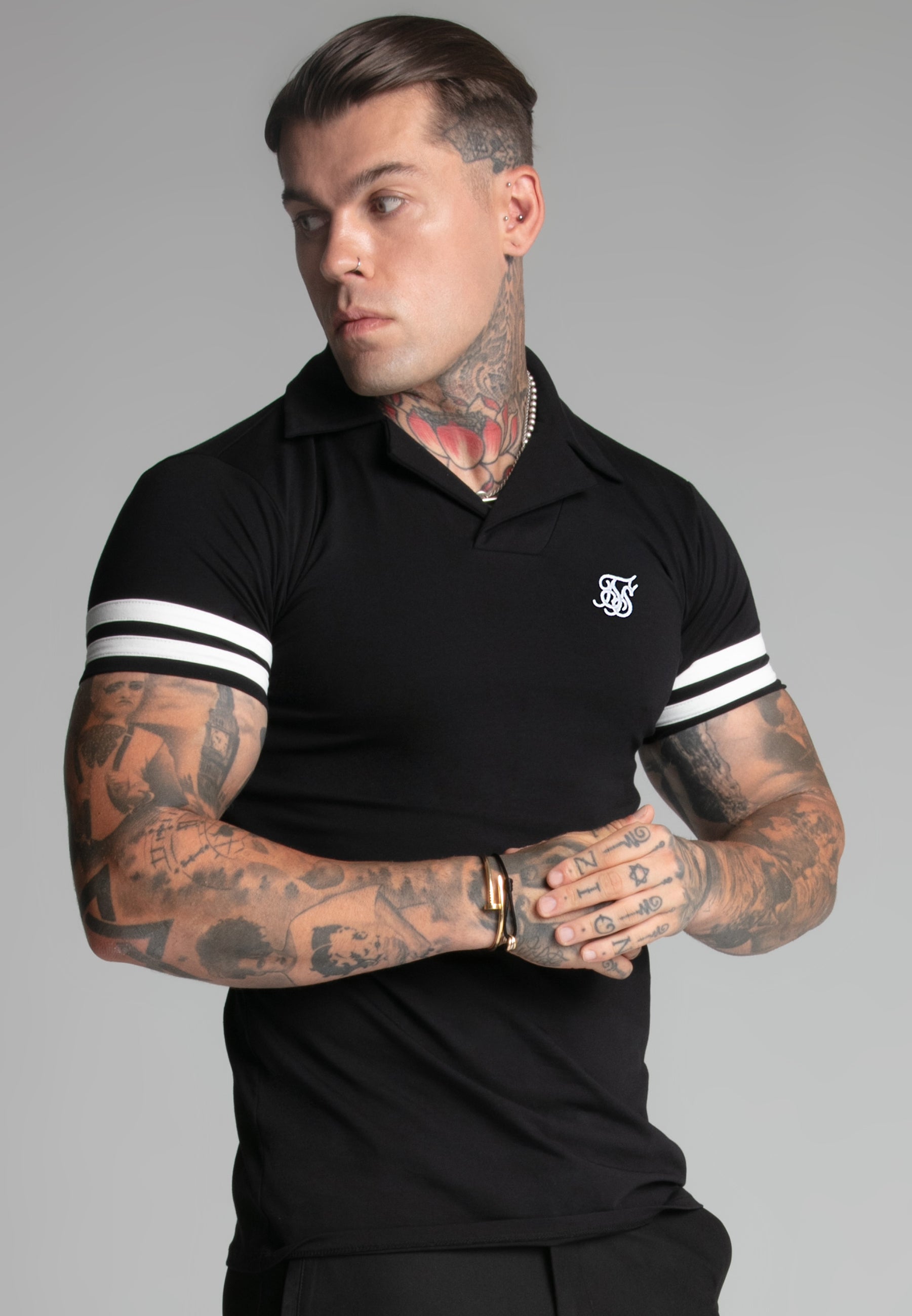 Polo Tournament Revere in nero Magliette SikSilk