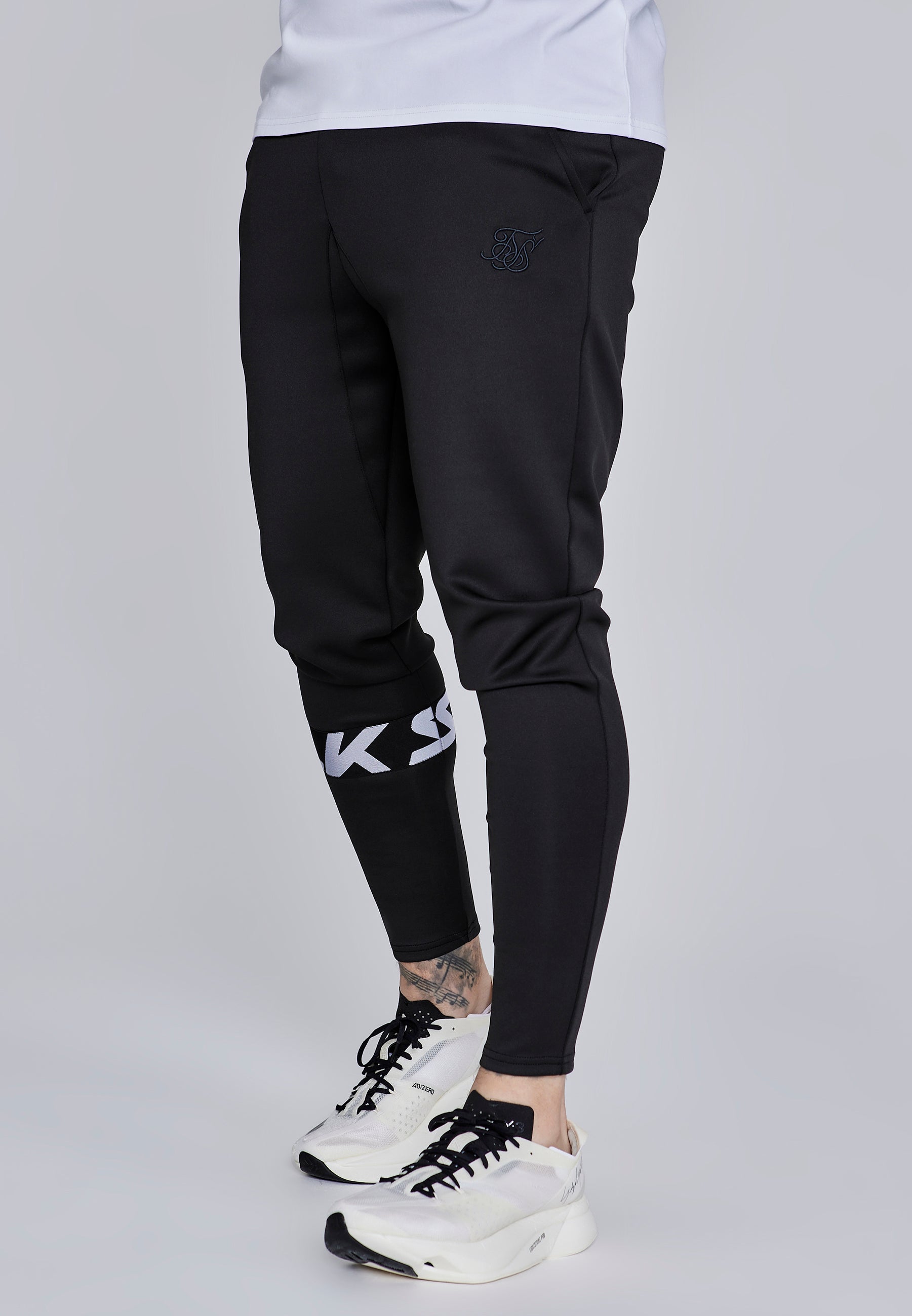 Joggers muscolosi in nero Pantaloni SikSilk