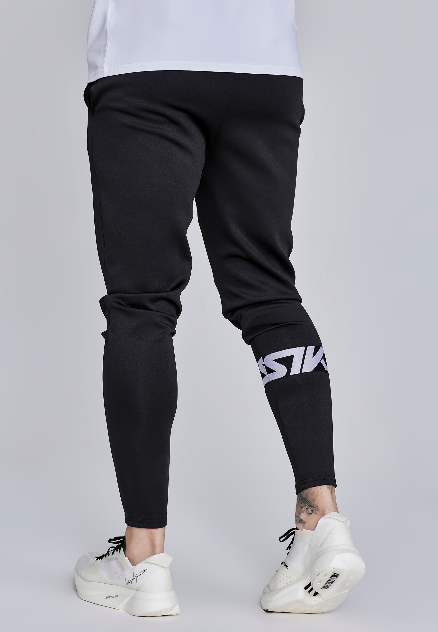 Joggers muscolosi in nero Pantaloni SikSilk