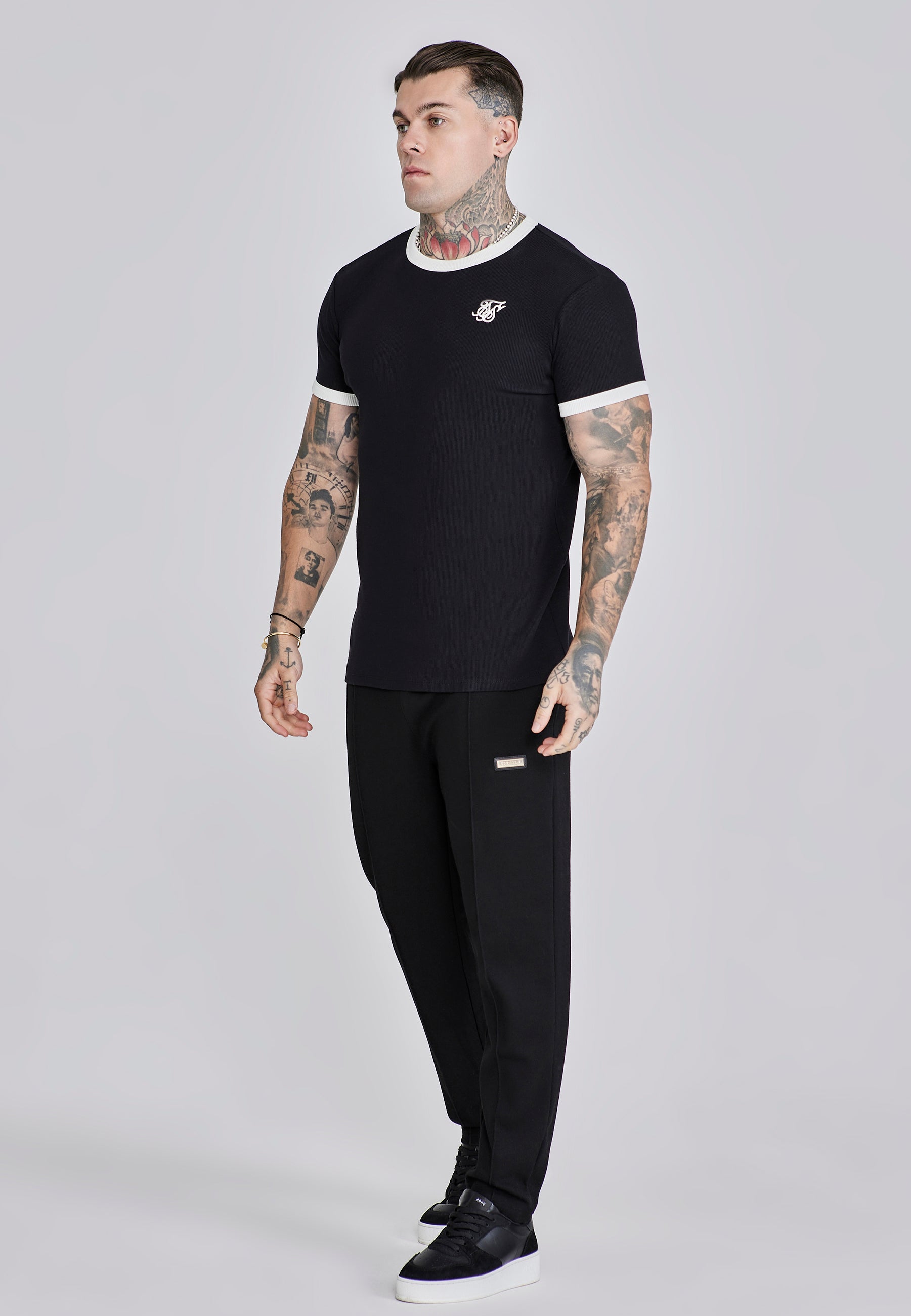 Maglietta a coste Ringer in nero Magliette SikSilk
