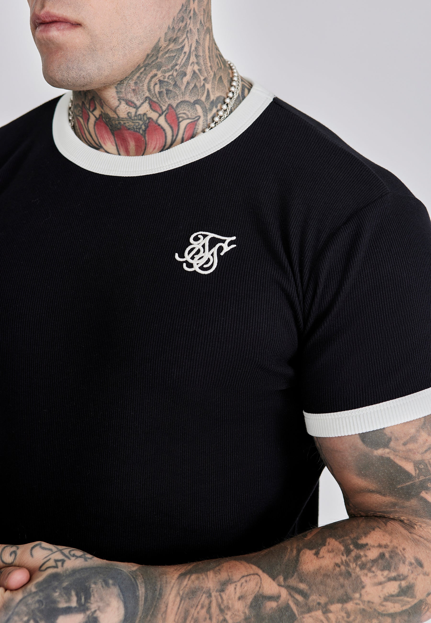 Maglietta a coste Ringer in nero Magliette SikSilk