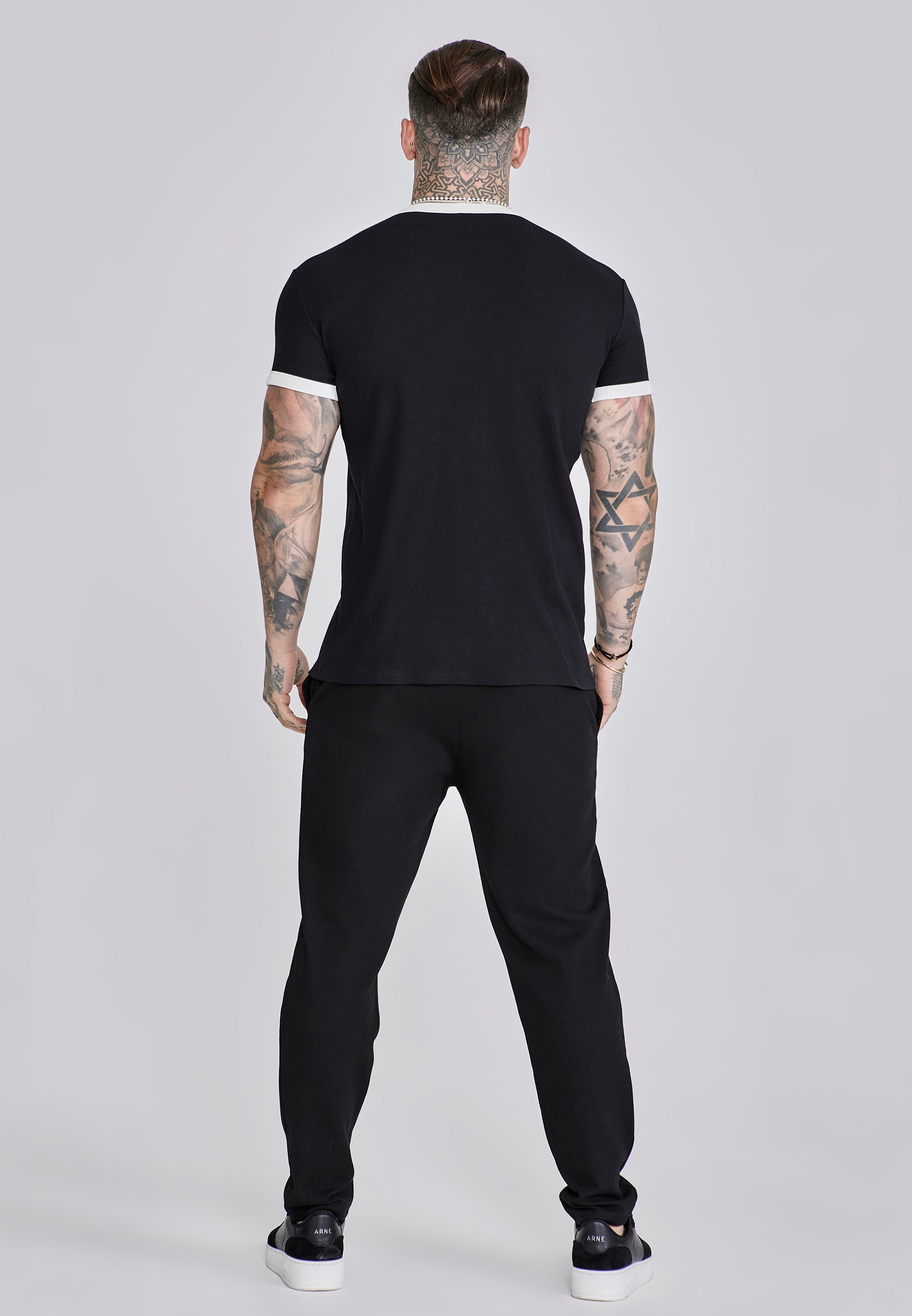 Maglietta a coste Ringer in nero Magliette SikSilk