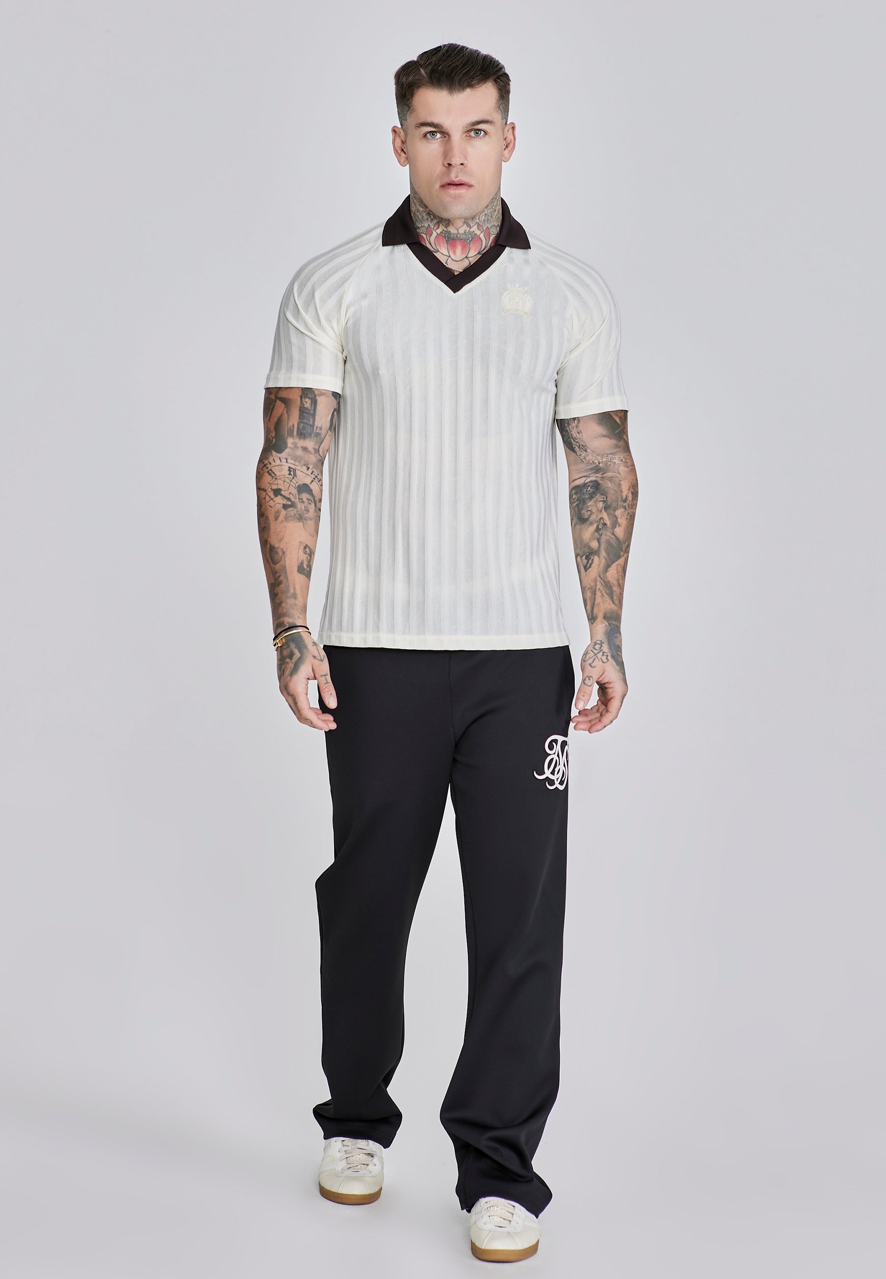 Pantaloni da corsa in nero Pantaloni SikSilk