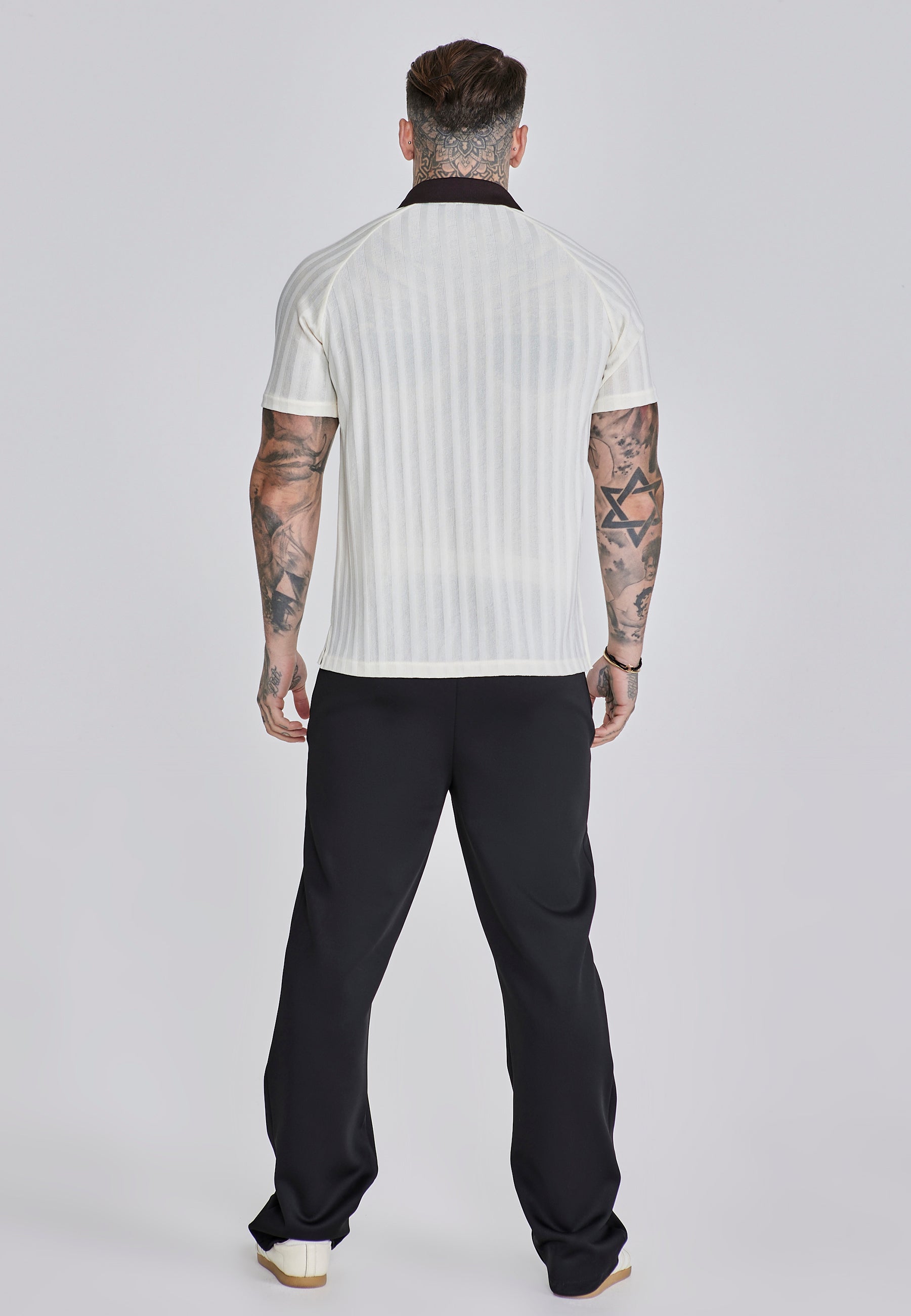 Pantaloni da corsa in nero Pantaloni SikSilk