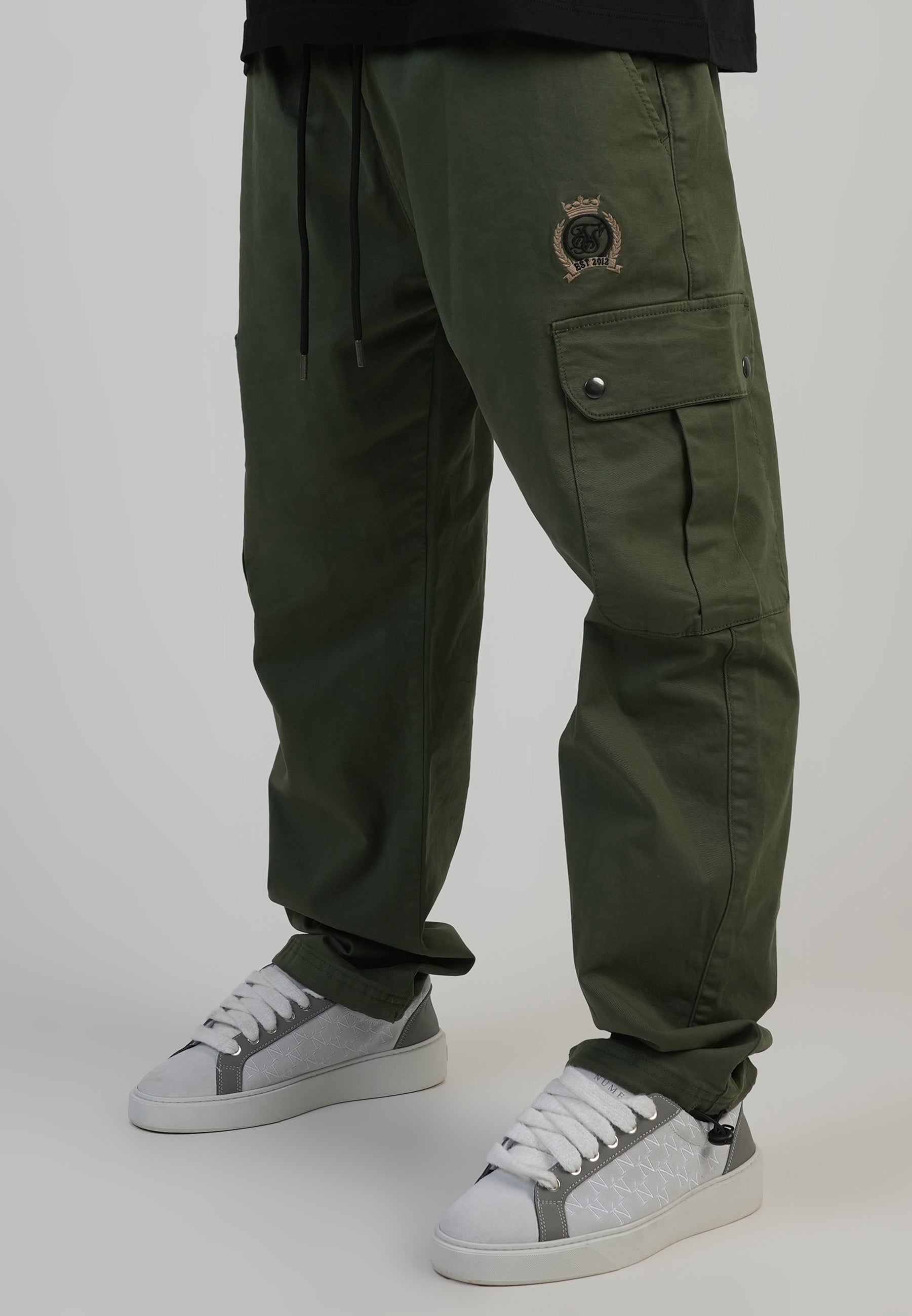 Pantaloni allentati Cargos in verde cachi SikSilk