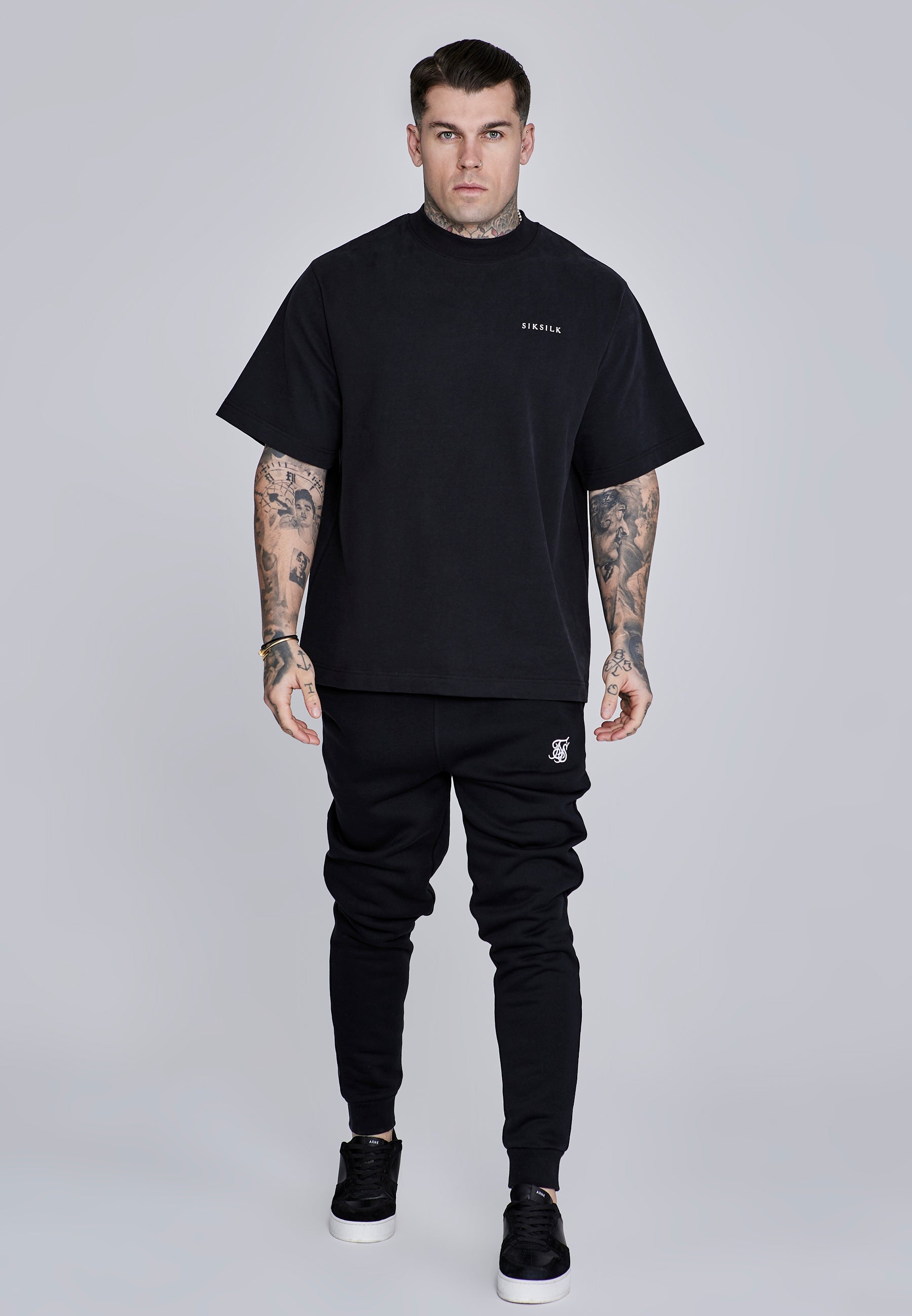 Joggers essenziali in nero Pantaloni SikSilk