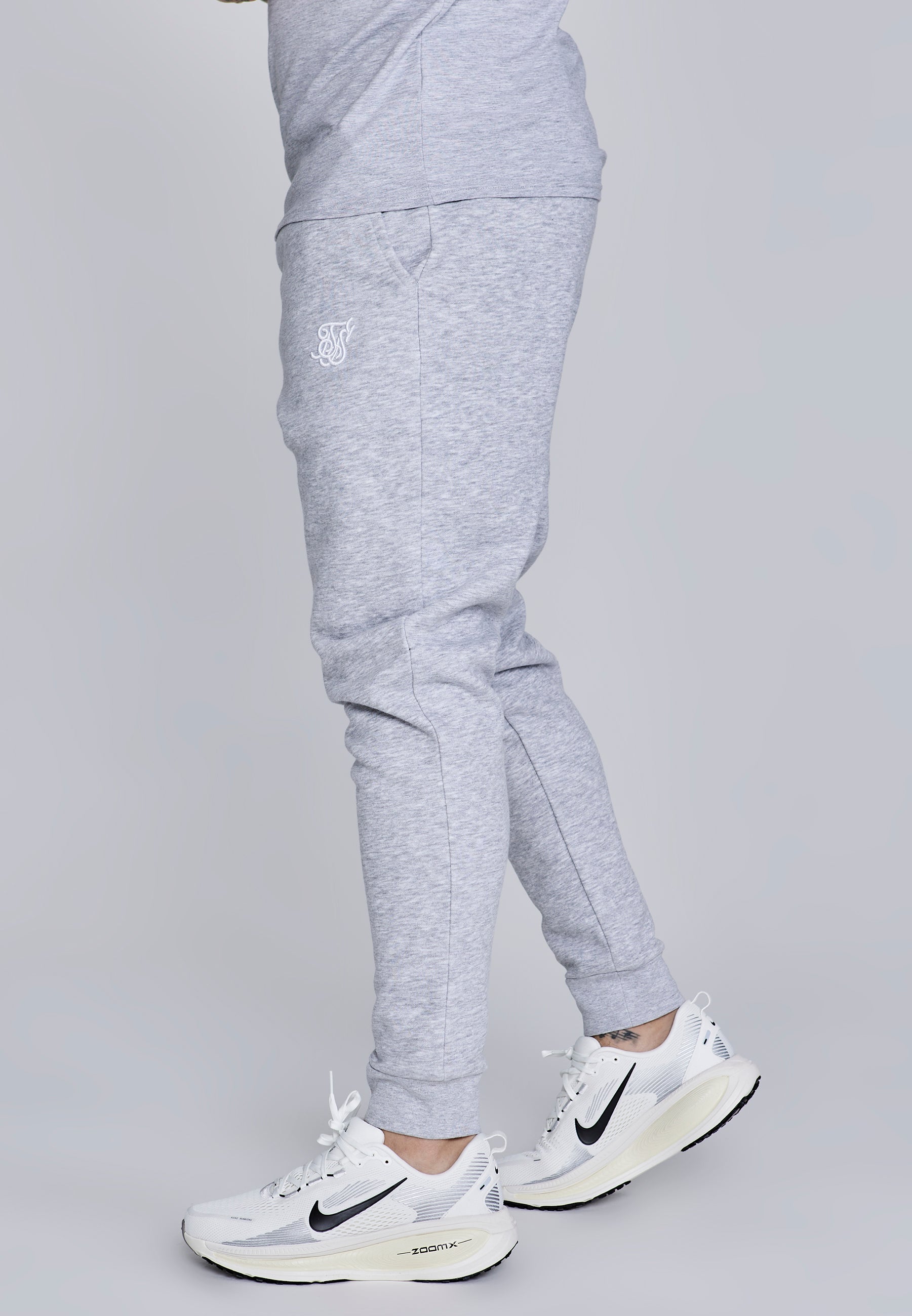 Joggers essenziali in marna grigia Pantaloni SikSilk