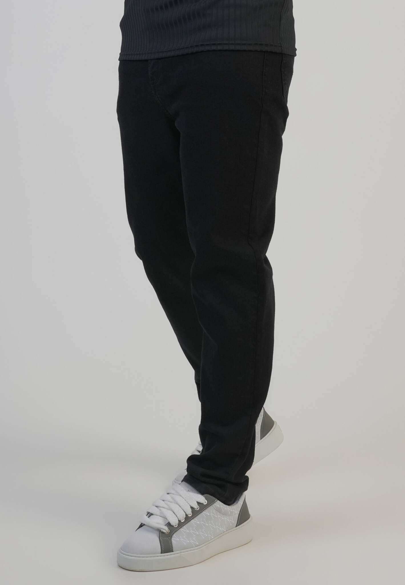 Jeans slim fit in nero Jeans SikSilk