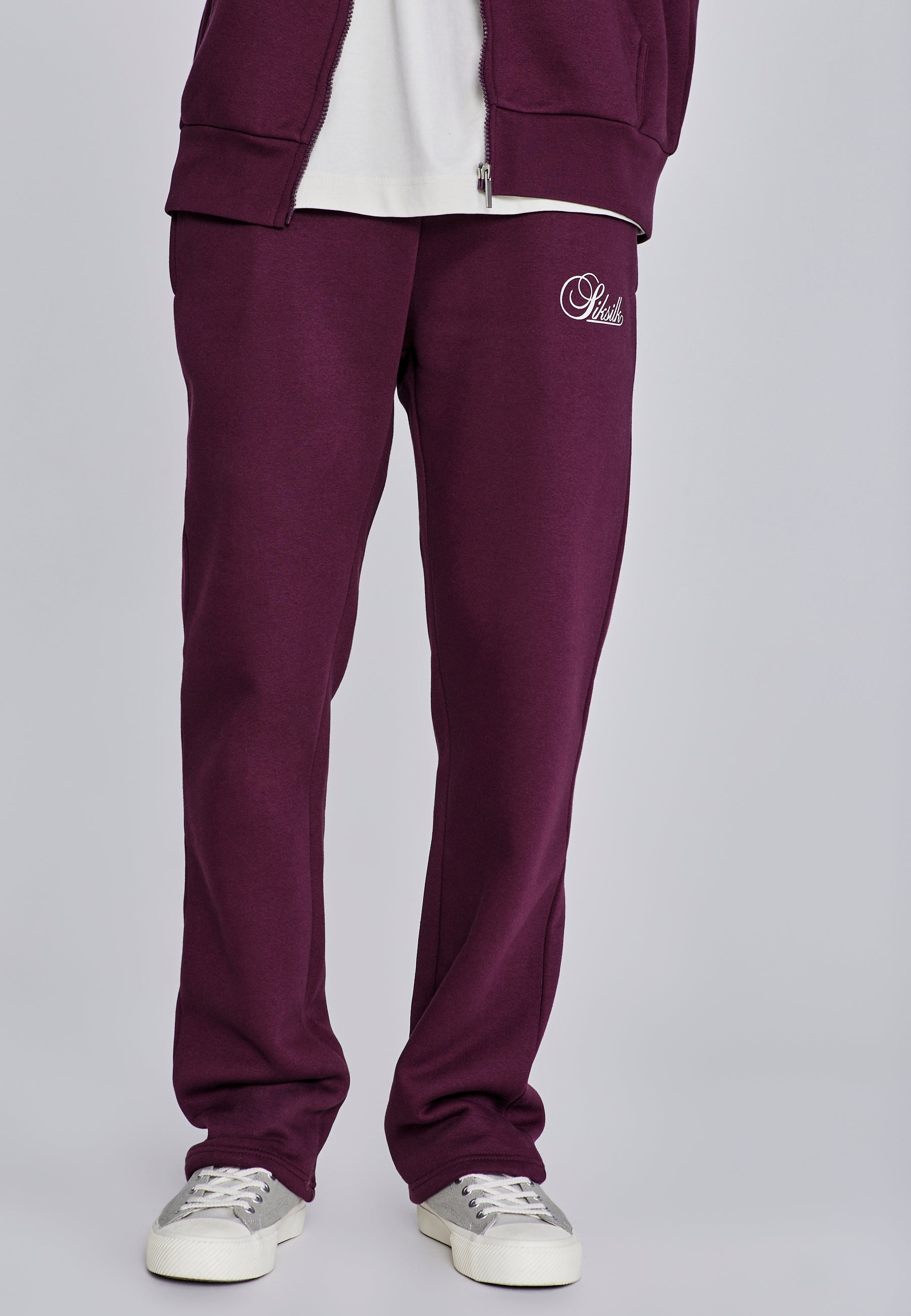 Pantaloni da corsa Essentials in borgogna Pantaloni SikSilk