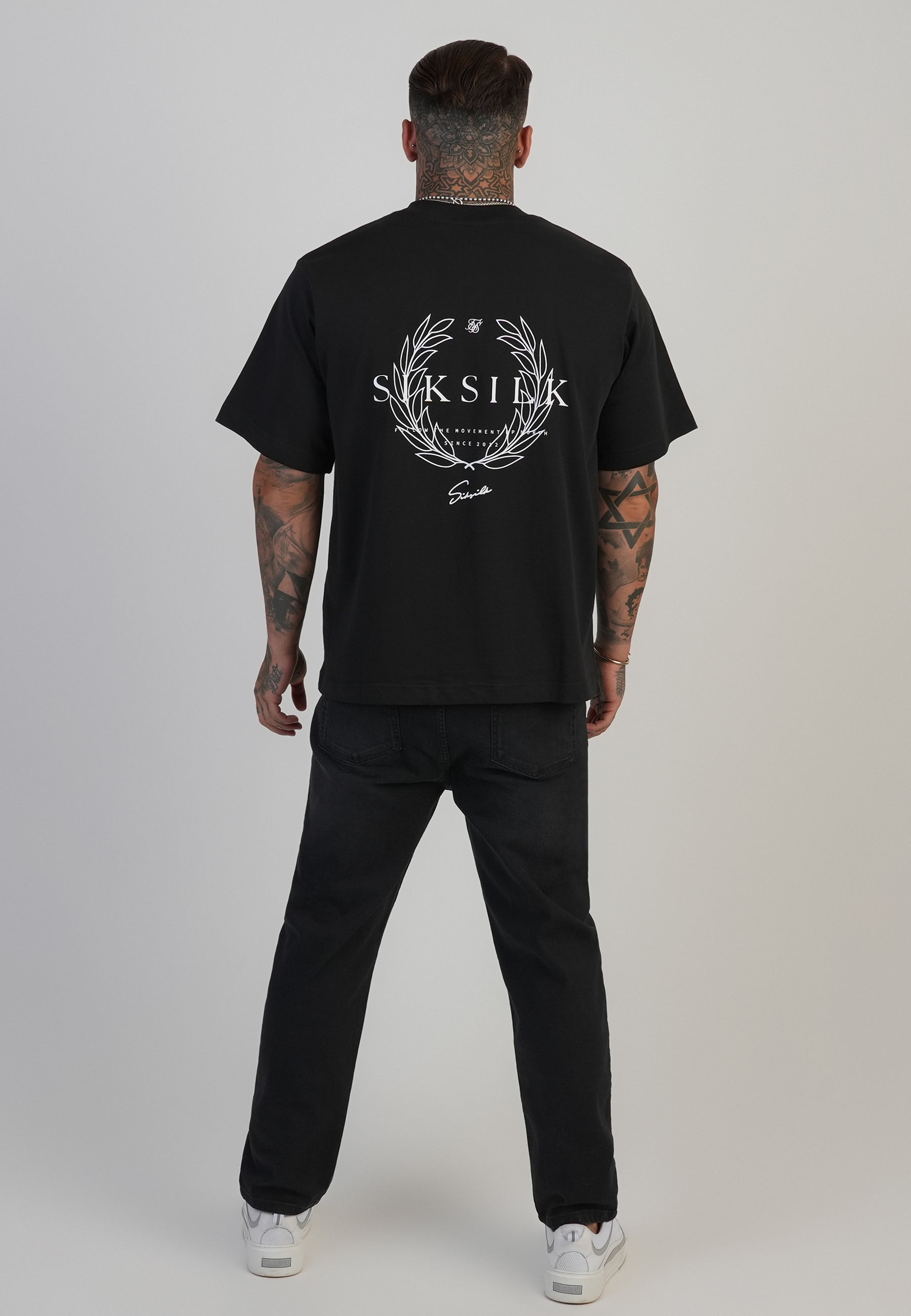 Jeans Tapered in nero lavato SikSilk