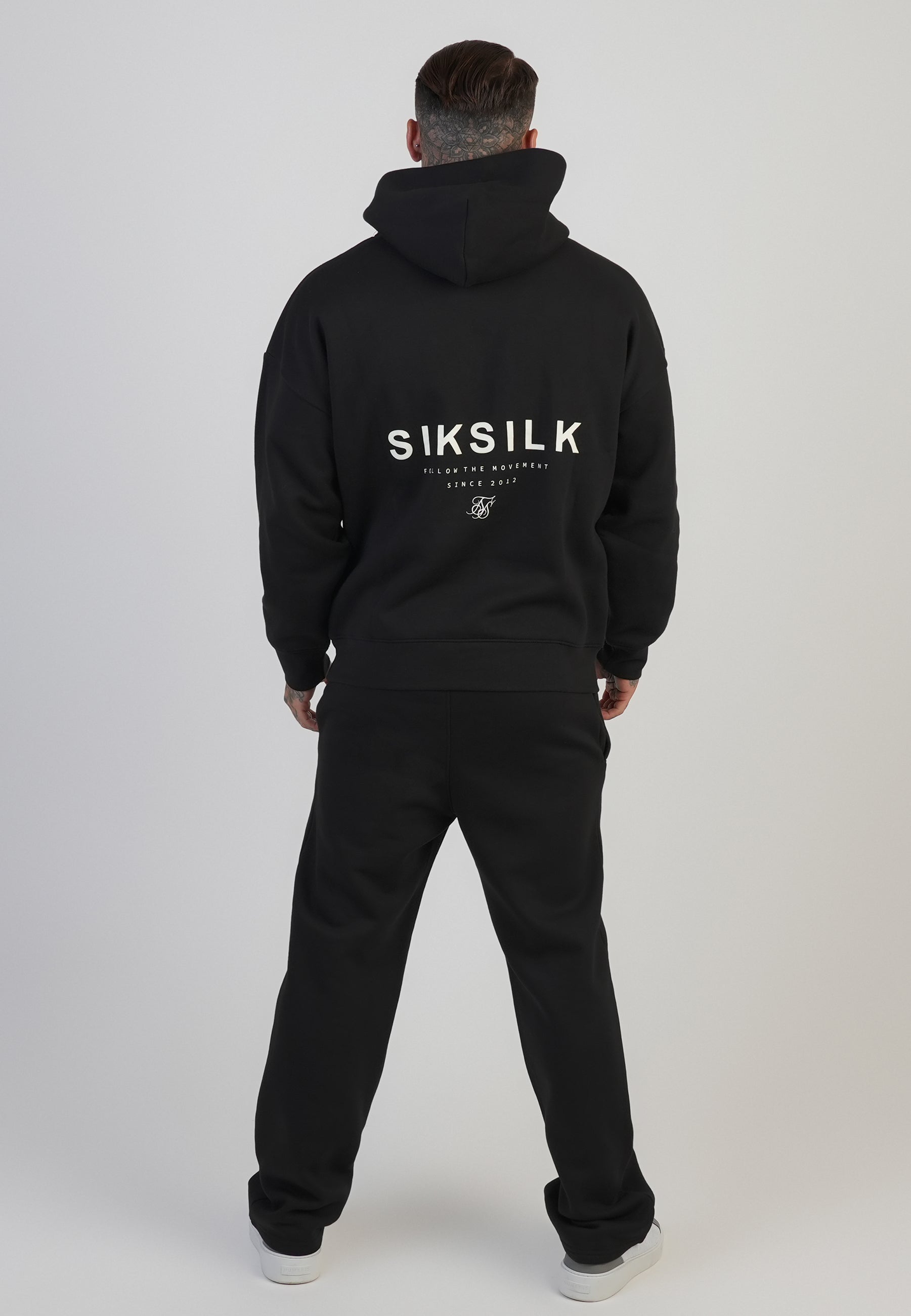 Pantaloni da corsa in nero Pantaloni SikSilk