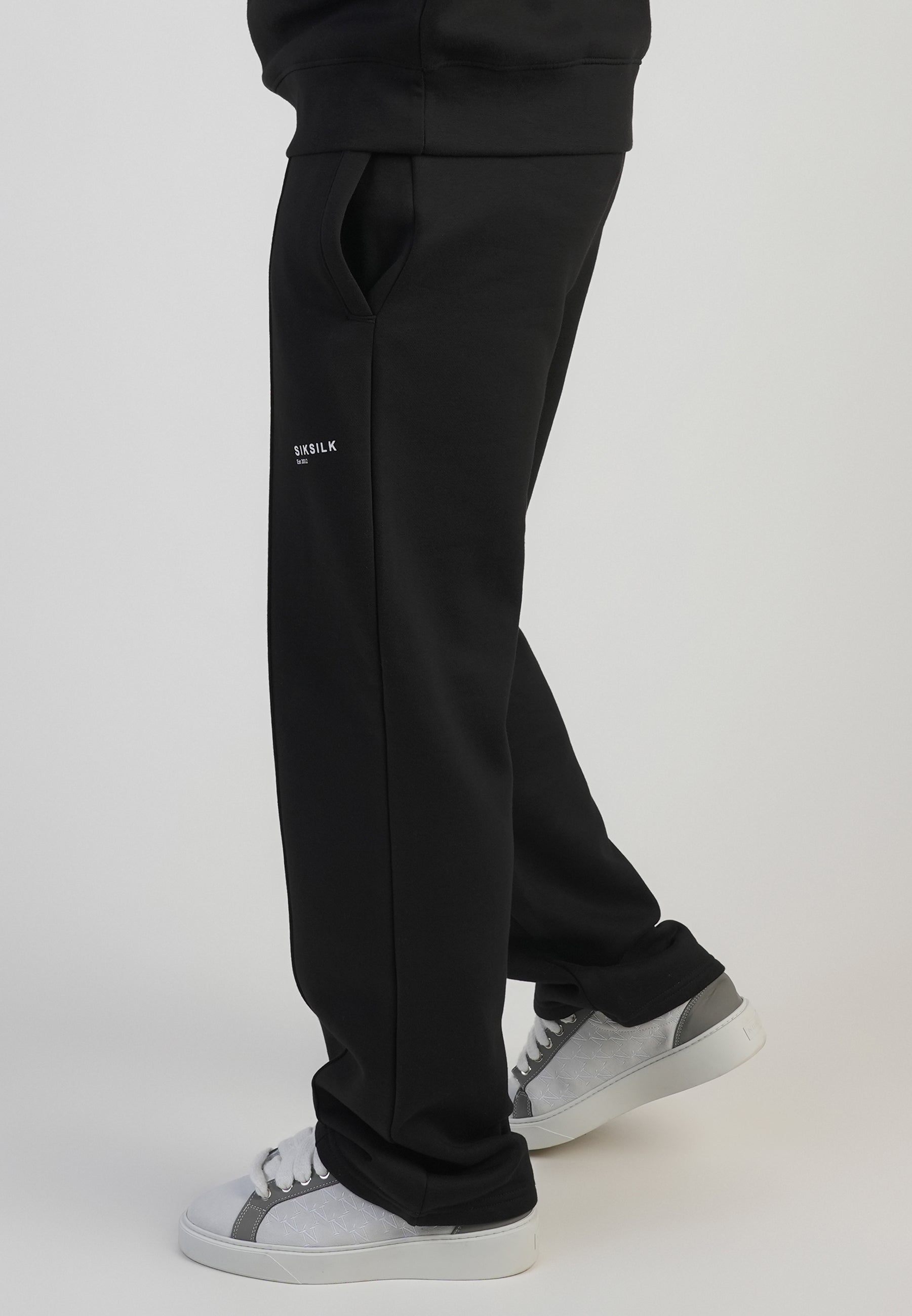 Pantaloni da corsa in nero Pantaloni SikSilk