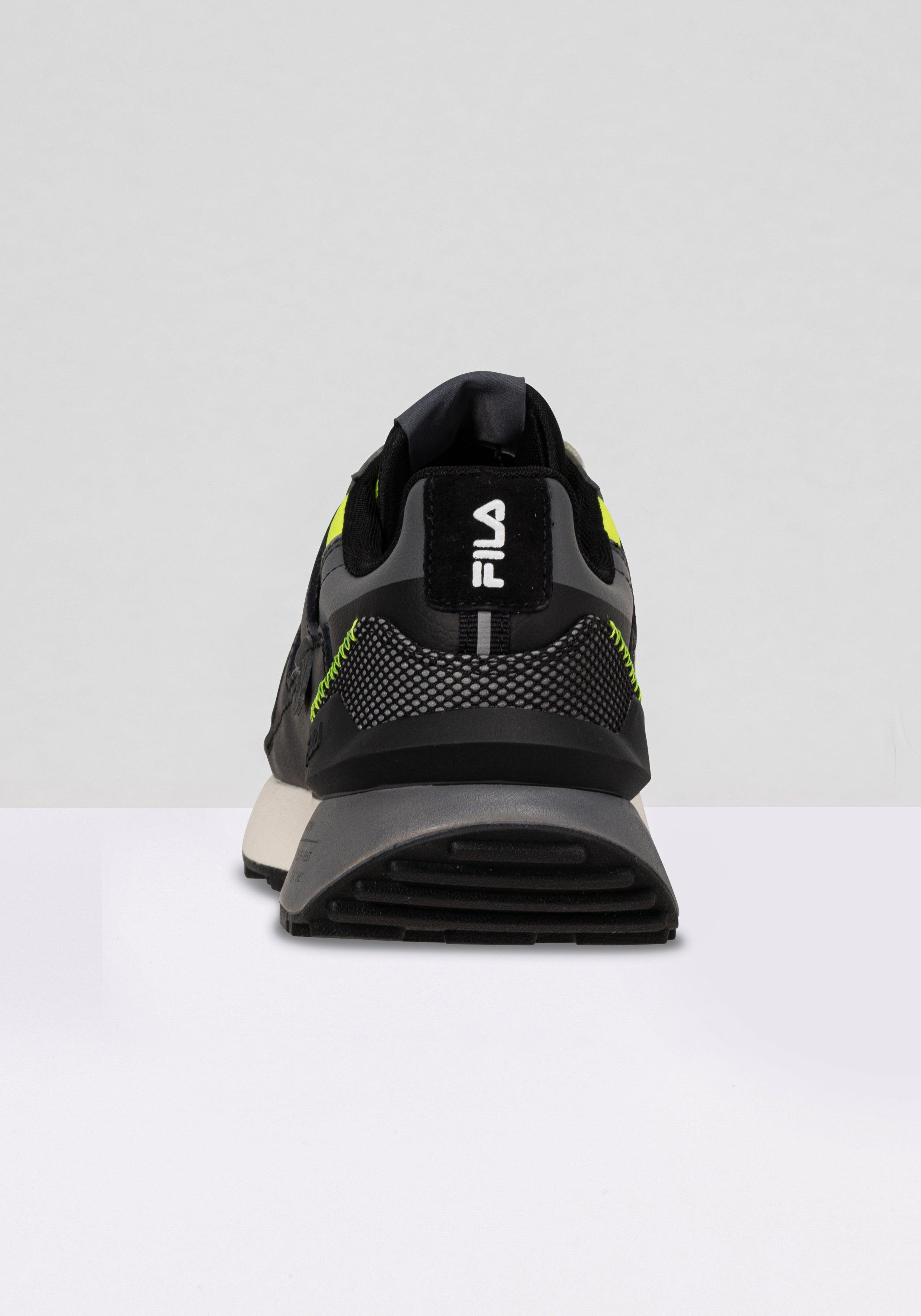 Sneakers Contempo in giallo sicurezza-nero Fila   